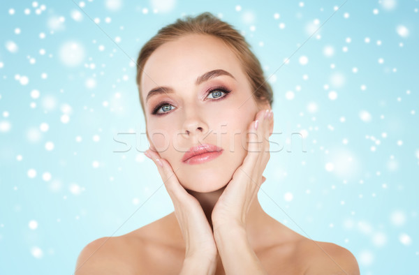 красивая женщина прикасаться лице снега красоту люди Сток-фото © dolgachov