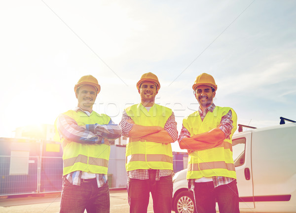 Feliz masculina constructores alto visible aire libre Foto stock © dolgachov