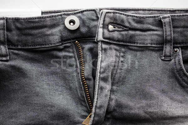 close up of denim pants or jeans with zipper Stock photo © dolgachov