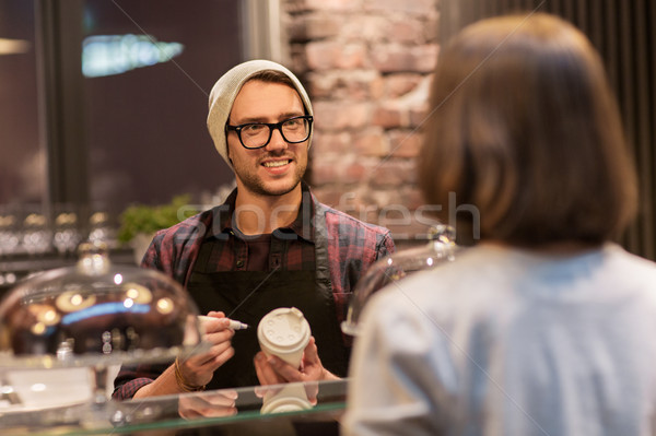 Stock photo: man or barman with coffee cup and customer at cafe