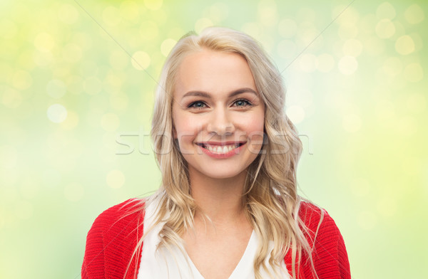 Szczęśliwy uśmiechnięty młoda kobieta czerwony sweter rozpinany moda Zdjęcia stock © dolgachov