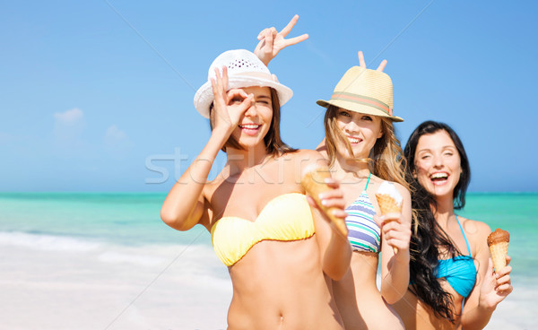 Stockfoto: Groep · glimlachend · vrouwen · eten · ijs · strand