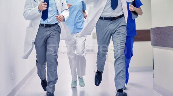 close up of medics or doctors running at hospital Stock photo © dolgachov