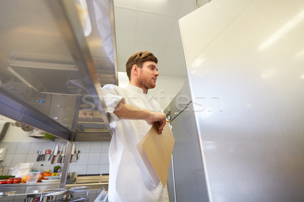 Chef clipboard inventário cozinha cozinhar profissão Foto stock © dolgachov