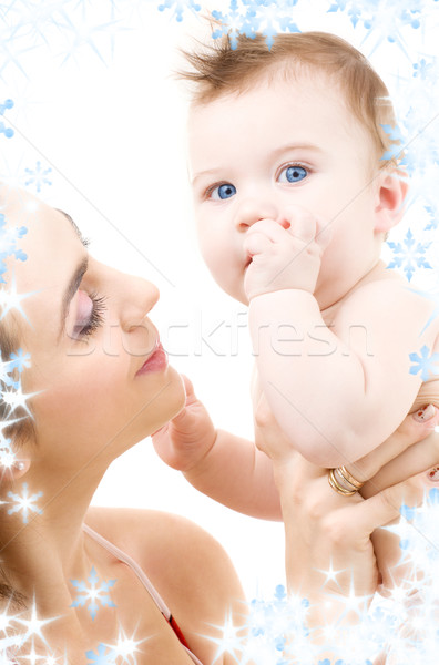 Baba anya kezek kép boldog hópelyhek Stock fotó © dolgachov