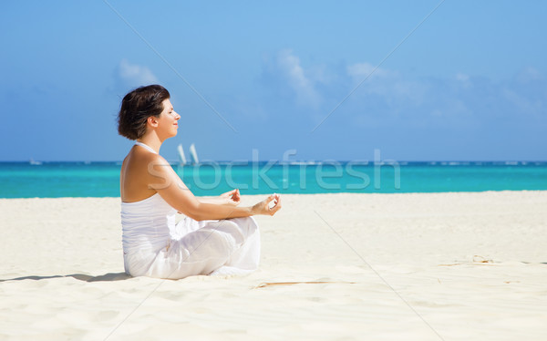 медитации пляж счастливым женщину Lotus создают Сток-фото © dolgachov