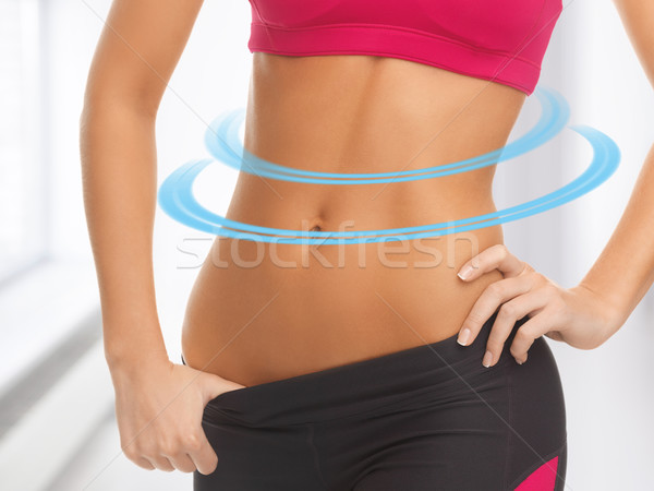 woman trained abs Stock photo © dolgachov