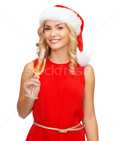 woman in red dress with a glass of champagne Stock photo © dolgachov
