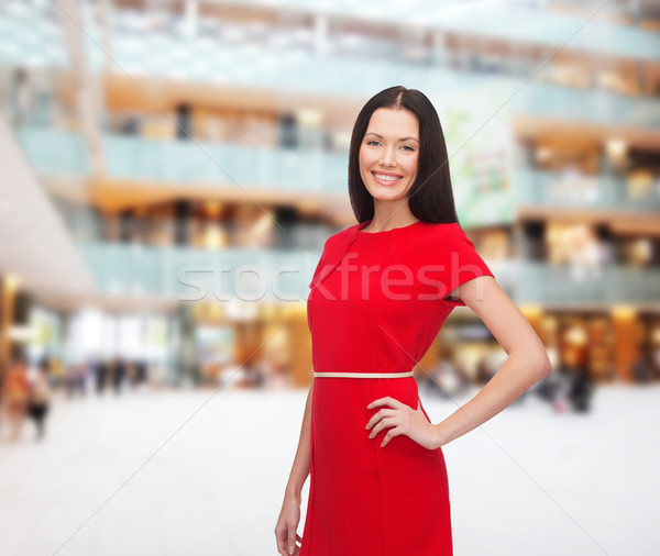 улыбающаяся женщина красное платье Рождества праздников празднования Сток-фото © dolgachov