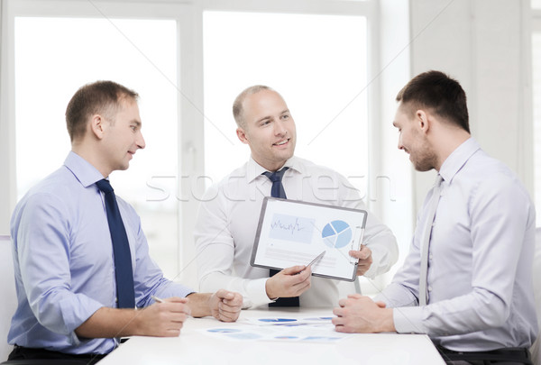Mosolyog üzletemberek papírok iroda üzlet üzletember Stock fotó © dolgachov