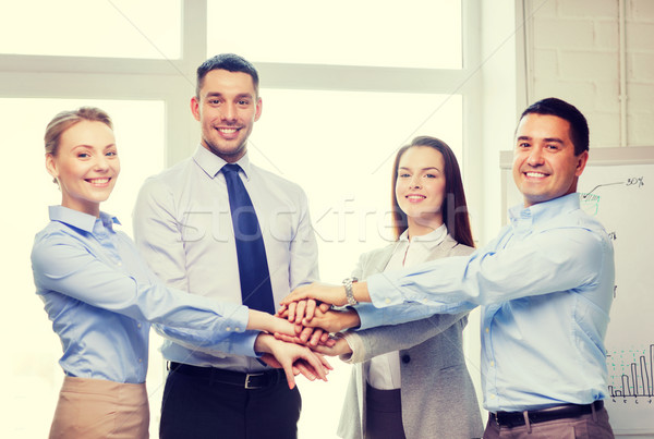 Stock photo: business team celebrating victory in office
