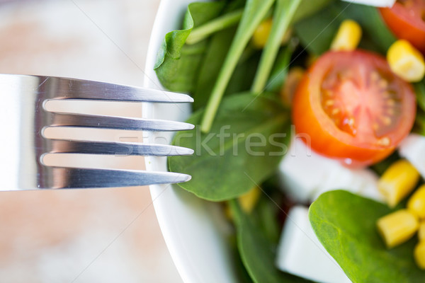 close up of vegetable salad bowl Stock photo © dolgachov