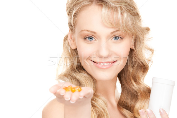 Jonge vrouw pillen foto witte vrouw medische Stockfoto © dolgachov