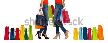 close up of woman on high heels with shopping bags Stock photo © dolgachov