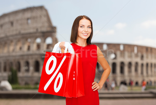 Femeie roşu vânzare reducere turism Imagine de stoc © dolgachov