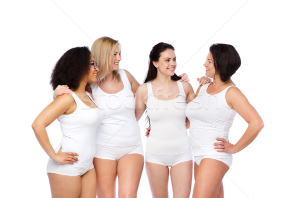 Grup mutlu farklı kadın beyaz iç çamaşırı Stok fotoğraf © dolgachov
