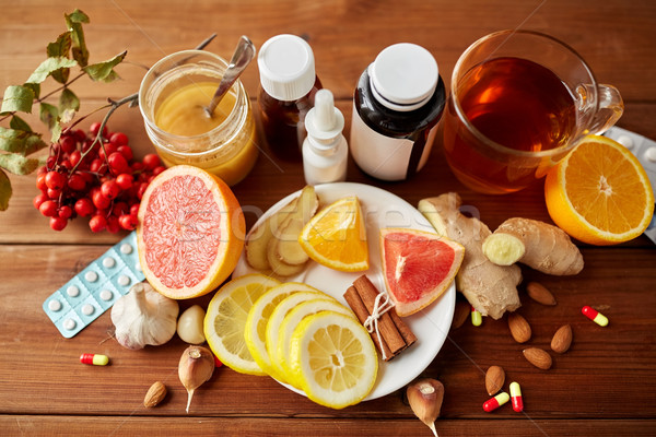 Tradicional medicina drogas saúde gripe mesa de madeira Foto stock © dolgachov