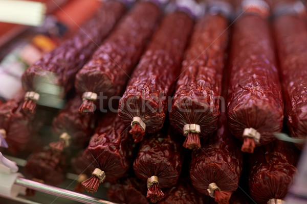 Szalámi kolbász élelmiszerbolt hús termékek vásár Stock fotó © dolgachov