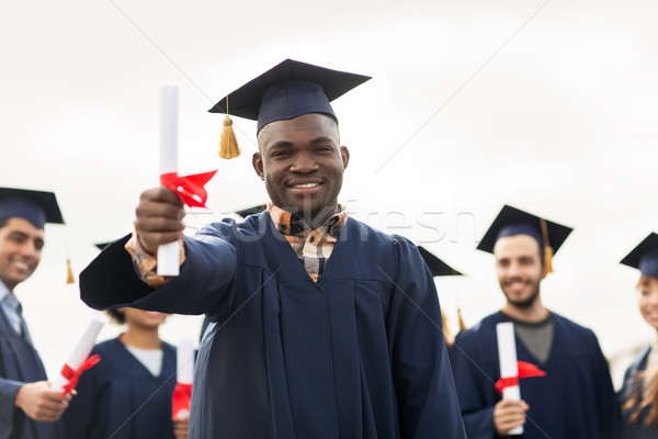 Foto d'archivio: Felice · studenti · istruzione · laurea · persone · gruppo