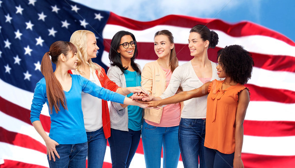 united international women over american flag Stock photo © dolgachov