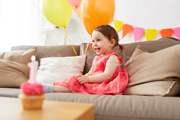 happy baby girl on birthday party at home Stock photo © dolgachov