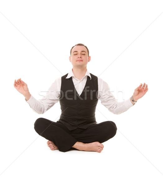 businessman sitting in lotus pose Stock photo © dolgachov