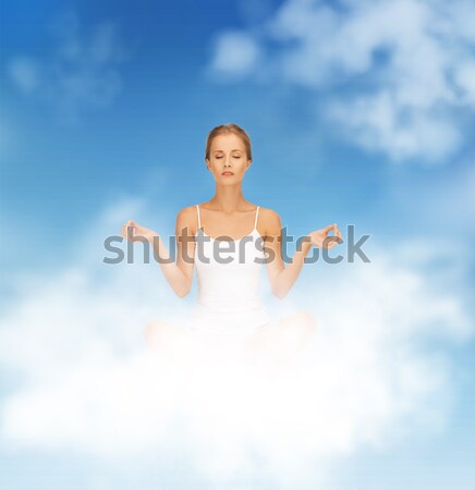 woman in undrewear practicing yoga lotus pose Stock photo © dolgachov