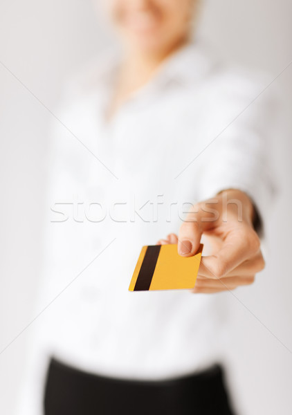 woman showing gold credit card Stock photo © dolgachov