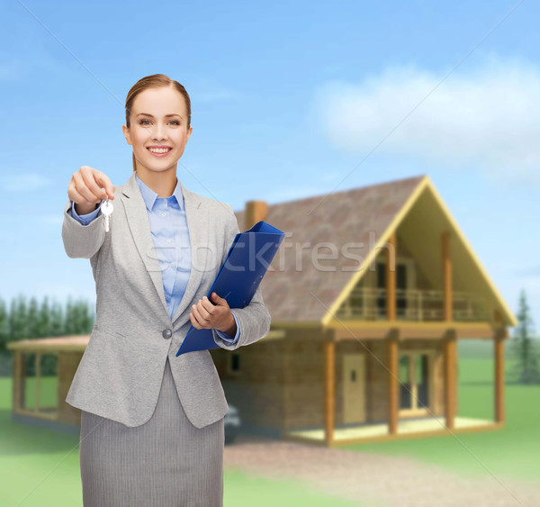 [[stock_photo]]: Souriant · femme · d'affaires · dossier · touches · affaires · immobilier
