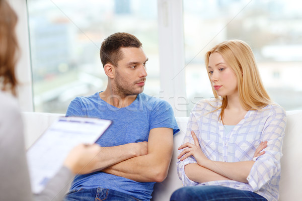 young couple with a problem at psychologist office Stock photo © dolgachov