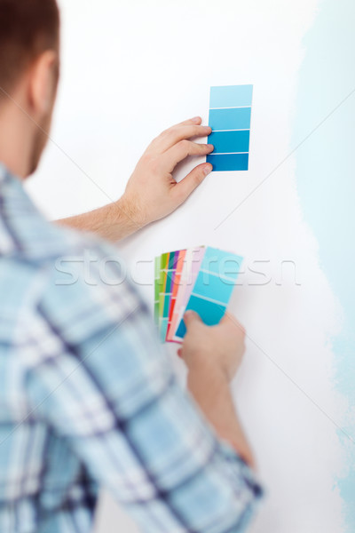 close up of male wit color pallets Stock photo © dolgachov