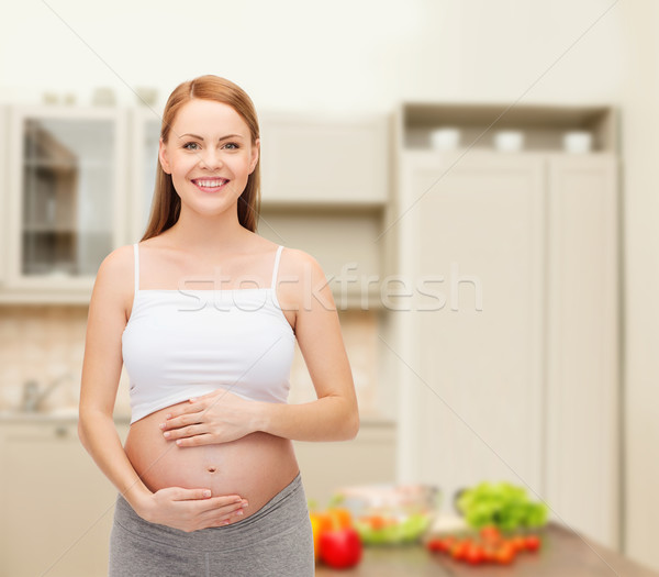 Feliz futuro madre tocar vientre embarazo Foto stock © dolgachov