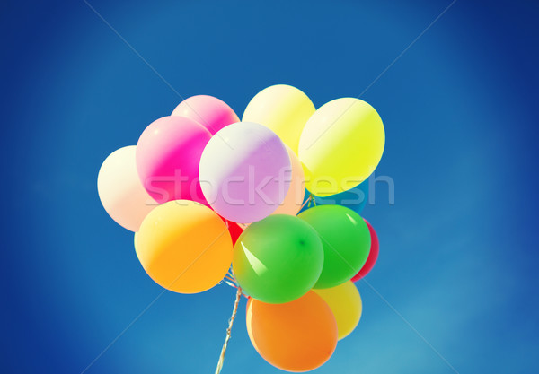 Színes léggömbök égbolt ünneplés nap születésnap Stock fotó © dolgachov