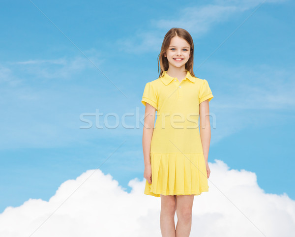 Sorridente little girl amarelo vestir felicidade infância Foto stock © dolgachov