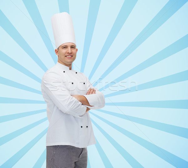 happy male chef cook with crossed hands Stock photo © dolgachov