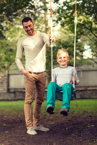 happy family in front of house outdoors Stock photo © dolgachov