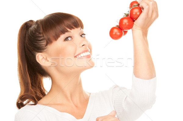 woman with ripe tomatoes Stock photo © dolgachov