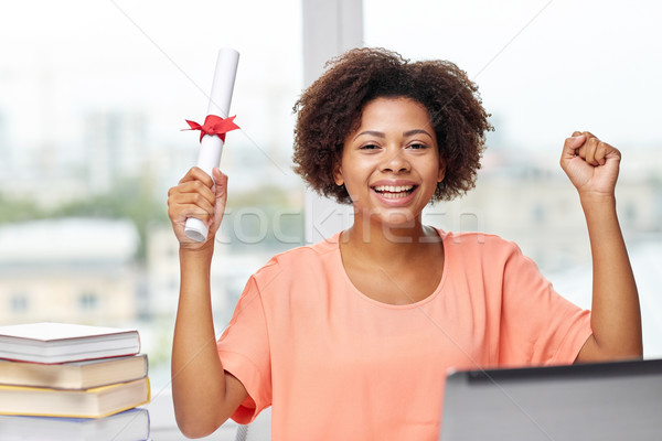 Stockfoto: Gelukkig · afrikaanse · vrouw · laptop · boeken · diploma