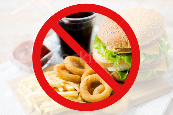 close up of fast food and drink behind no symbol Stock photo © dolgachov