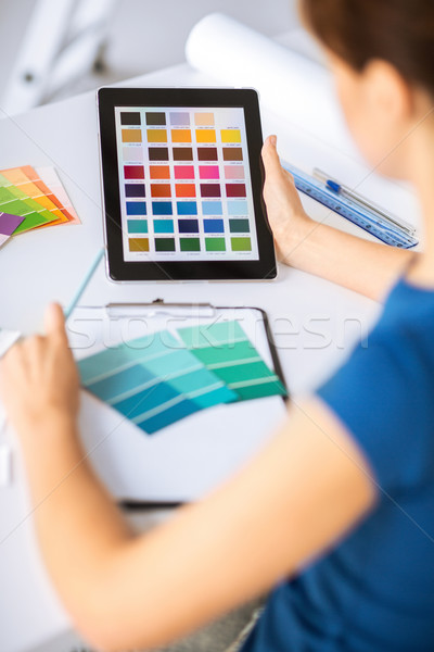 Stock photo: woman working with color samples for selection