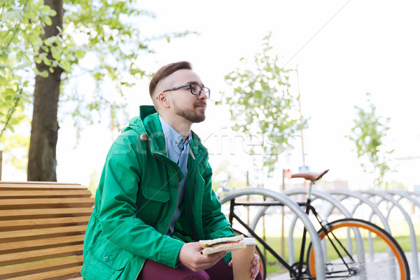 Heureux jeunes homme fixé engins [[stock_photo]] © dolgachov