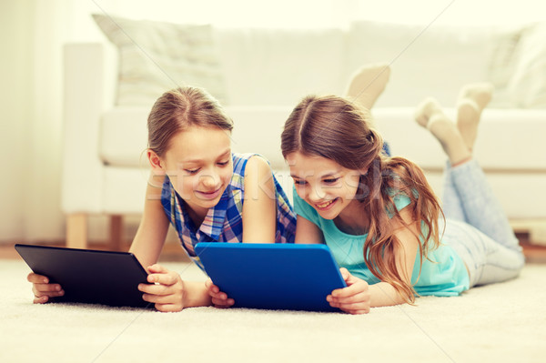 Stock fotó: Boldog · lányok · táblagép · padló · otthon · emberek