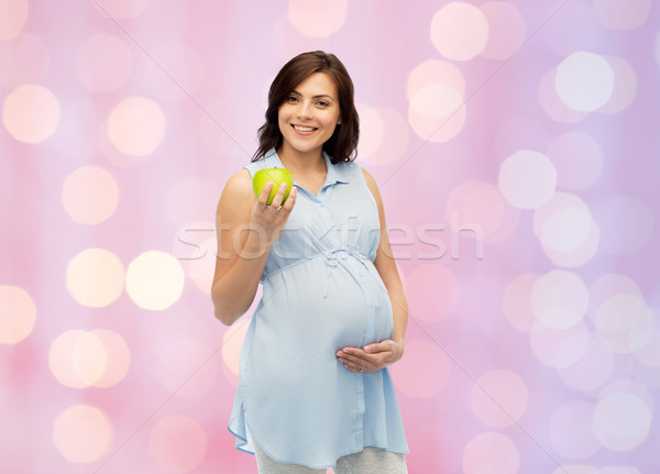 Fericit femeie gravida verde măr sarcină Imagine de stoc © dolgachov