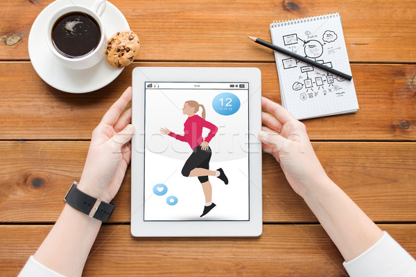Közelkép nő fitnessz app táblagép sport Stock fotó © dolgachov