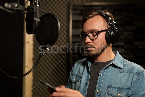 Mann Kopfhörer Musik Tonstudio zeigen Geschäftsleute Stock foto © dolgachov