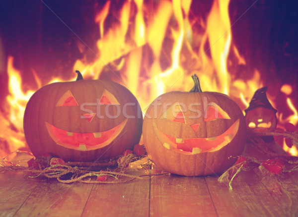 Halloween tökök asztal tűz ünnepek dekoráció Stock fotó © dolgachov