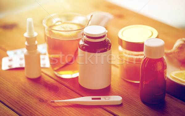 Drugs thermometer honing beker thee hout Stockfoto © dolgachov