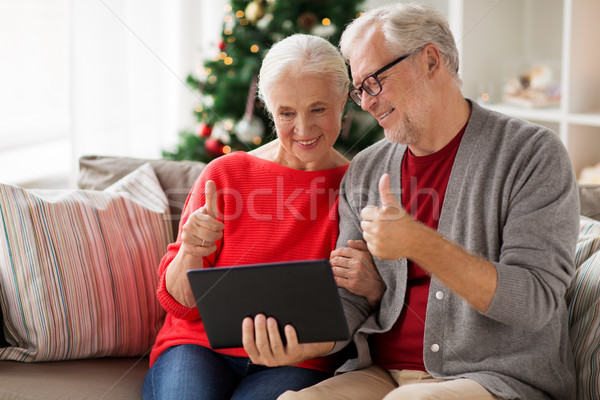 Heureux couple de personnes âgées Noël vacances communication [[stock_photo]] © dolgachov