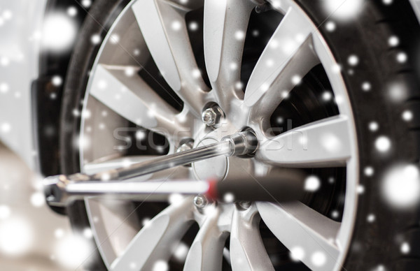 Stock photo: screwdriver and car wheel tire