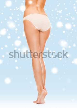 Gezonde benen witte bikini slipje klassiek Stockfoto © dolgachov